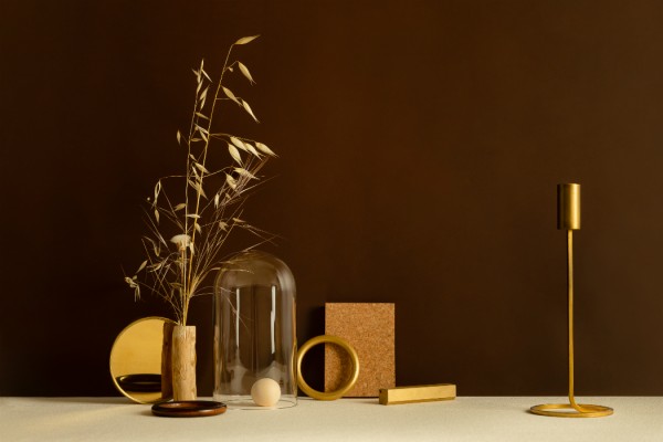 brown earth tones with gold and corck still life editorial